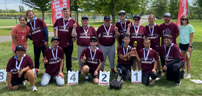 Special Olympic adults with their medals 